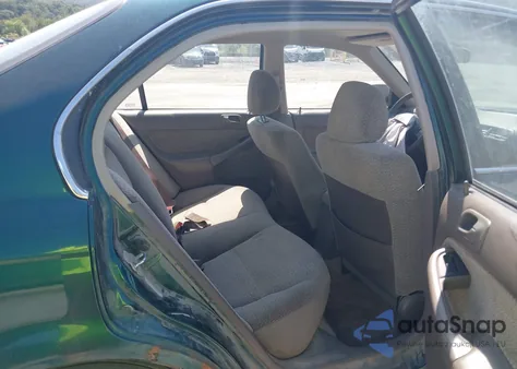 1999 Honda Civic Lx z USA, uszkodzony, nr VIN 2HGEJ6670XH535122